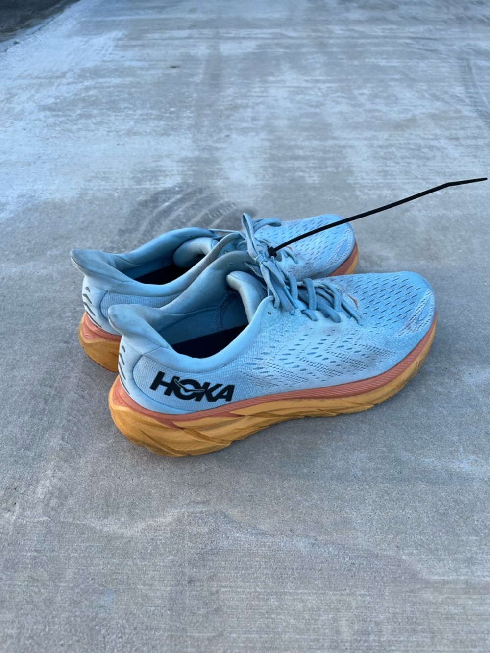 Hoka Men’s Sky Blue Running Shoes with Orange-Tan Sole size 12